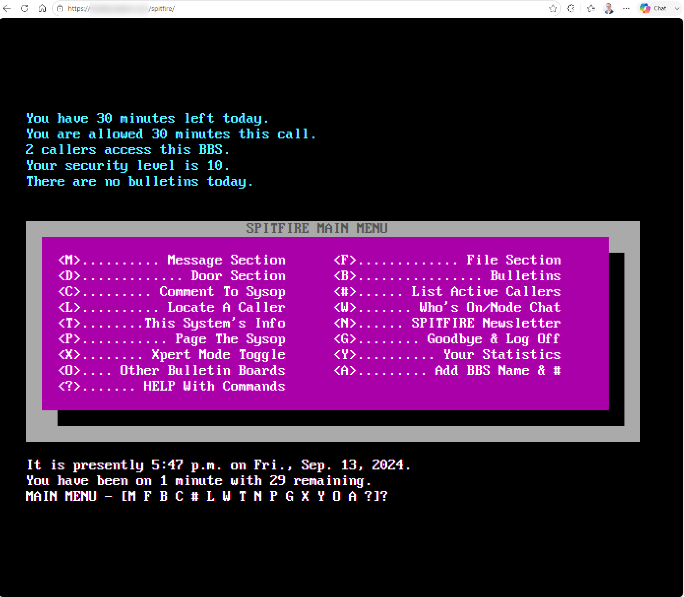 A Spitfire BBS main menu in magenta and grey ANSI panels, running in a browser tab.